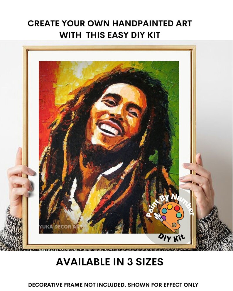 May include: Paint by numbers kit featuring a portrait of Bob Marley with a colorful background. The kit includes paints, brushes, and a canvas.  Available in 3 sizes.  "Paint By Number" and "DIY Kit" are written on the image.