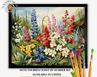 Könnte beinhalten: Malen nach Zahlen-Set mit einem bunten Blumenstrauß auf einer Wiese. Die Blumen sind rot, rosa, lila, blau, gelb und weiß. Das Set enthält Pinsel und Farben.