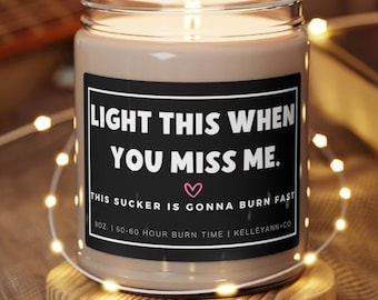May include: A brown glass candle with a black label that reads "LIGHT THIS WHEN YOU MISS ME. THIS SUCKER IS GONNA BURN FAST 9OZ. I 50-60 HOUR BURN TIME I KELLEYANN.CO".