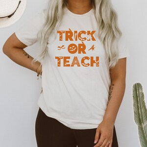 Trick or Teach Halloween shirts Halloween Teacher Shirt  Halloween shirts for teachers School Halloween shirt  Teacher Halloween Sweater