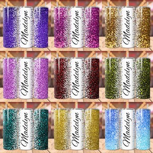 May include: Nine different colour glitter tumblers with the name Madelyn on the front. The tumblers are all white with a glitter design on the back.
