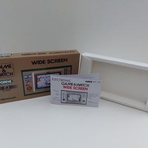 Manual y bandeja para la caja de juego y reloj Popeye PP-23 (NO INCLUYE JUEGO)