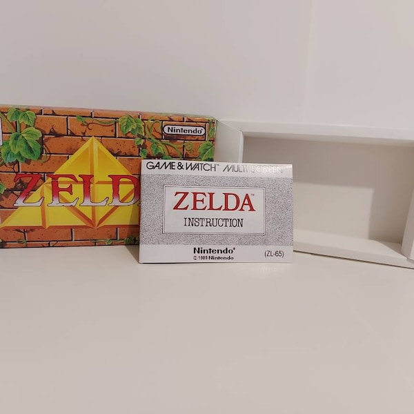 Manual y bandeja de Zelda ZL-65 Game & Watch Box - NO incluye JUEGO