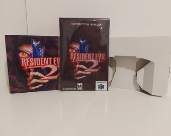 May include: A Resident Evil 2 video game box set for the Nintendo 64. The box art features a close-up of a person's face with the game's title in red and white. The set includes the game box, instruction booklet, and a cardboard insert.
