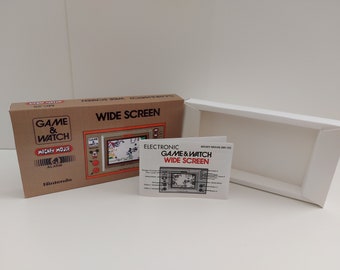 Pudełko z grą i zegarkiem Mickey Mouse MC-25, instrukcja i tacka - BRAK GRY w zestawie