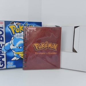Manual y bandeja de la caja Gameboy de Pokémon Azul (NO incluye juego)