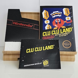 Manual de la caja de NES Clu Clu Land, cubierta protectora de bloque de polímero (sin juego incluido)