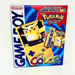 May include: A boxed Game Boy Color video game console featuring the Pokémon Yellow Version Game Pak. The box is blue, yellow, and red, with the Nintendo logo and the words "GAME BOY COLOR" prominently displayed. The box art includes Pikachu.