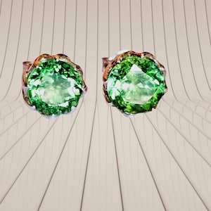 Green tourmaline studs in sterling silver with white rhodium finish