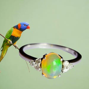 Opal and diamonds ring sterling silver .