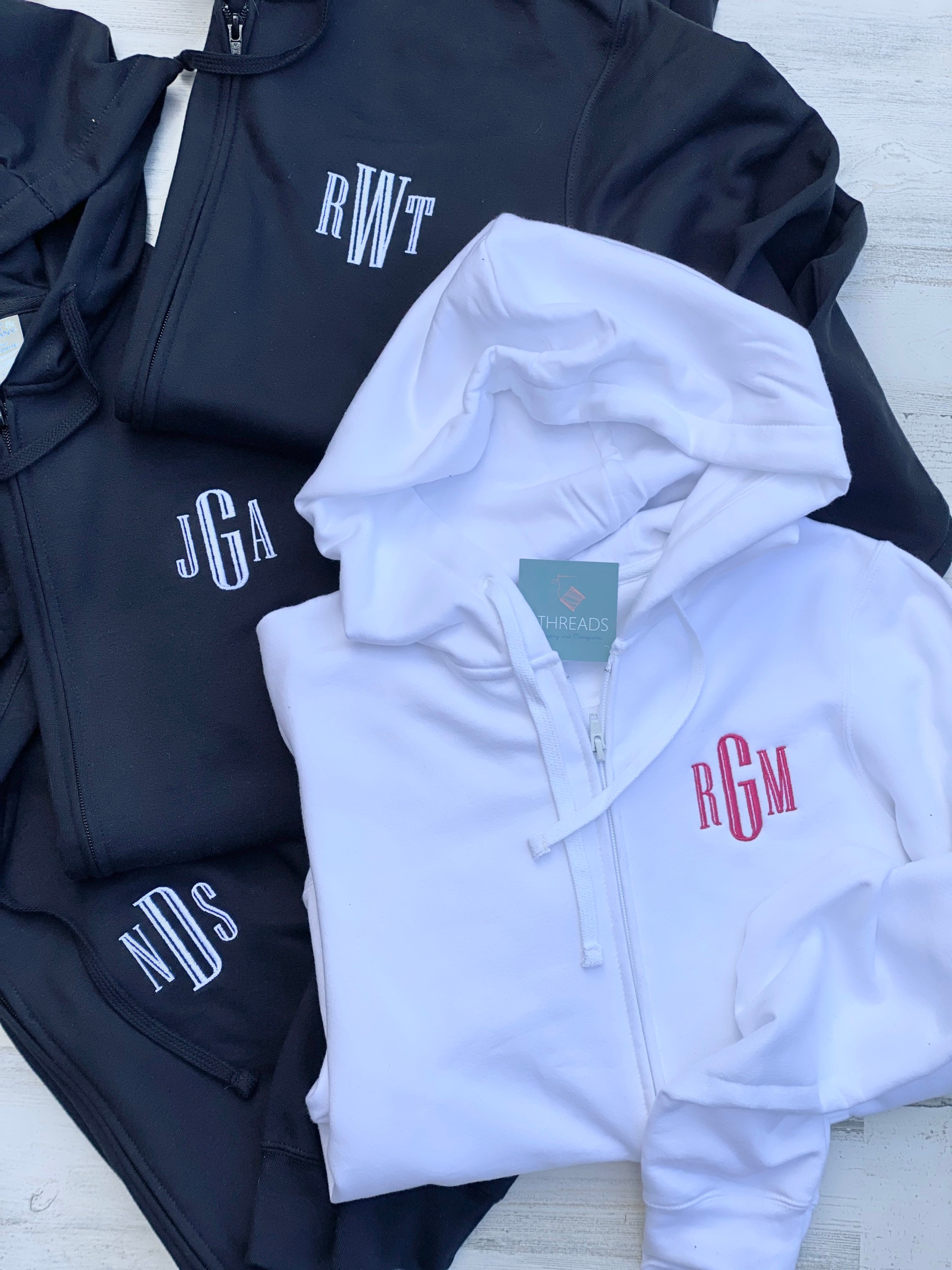 monogram zip up