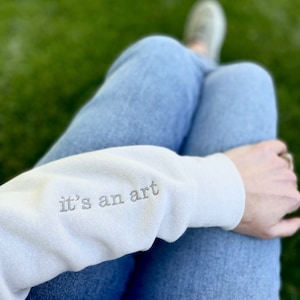 I Cry A Lot But I'm Productive Sweatshirt, It's An Art Sweatshirt, Minimalist Song Lyrics Crewneck & Embroidered Sleeve Detail, Comfy Shirt image 2