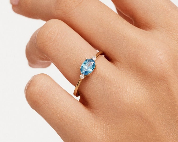 Featured listing image: 14k Gold Blue Topaz Ring with Diamonds, Oval December Birthstone Ring, Elegant Fine Jewelry Gift for Her, Dainty Gold Gemstone Band