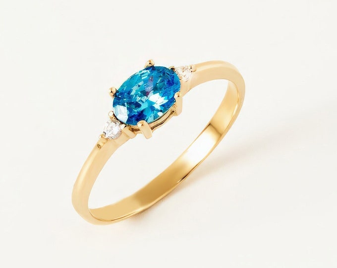 Featured listing image: 14k Gold Blue Topaz Ring with Diamond Accents: December Birthstone