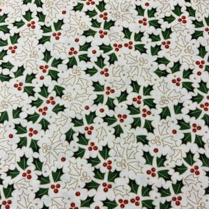 May include: White fabric featuring a repeating pattern of green holly leaves and red berries, with gold-coloured holly leaf outlines. This festive design is suitable for holiday-themed crafts and decorations.