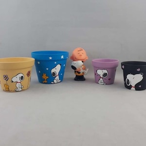 Beautiful hand painted Snoopy and Woodstock succulent clay pot planters for indoors and outdoors with drainage hole.