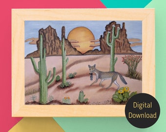 May include: A framed watercolor painting depicts a desert scene with cacti, a setting sun, and a coyote carrying prey. The artwork features a light brown wooden frame and the words "Digital Download" on a black circle.