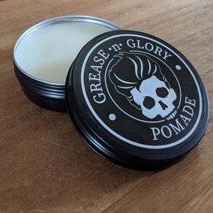 hair pomade by Grease n Glory.    Oil based 100g.