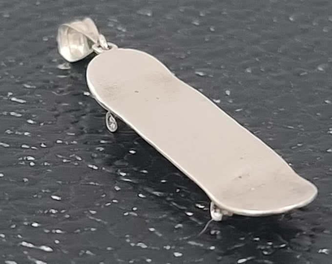 Skateboard pendant with laser engraving custom made per order