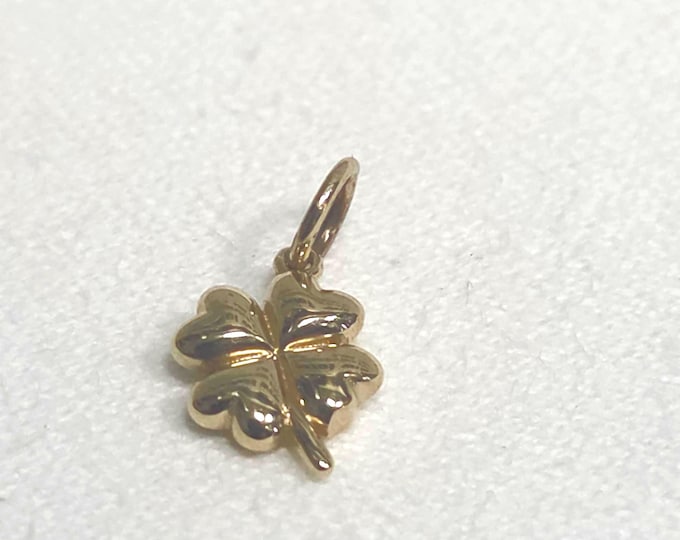 Lucky four leaf clover in 14k yellow gold puffy heart hollow clover design