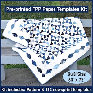 May include: A pre-printed quilt pattern kit with 113 newsprint templates. The kit includes a pattern for a blue and white quilt with a geometric design. The quilt is 60 inches by 72 inches.