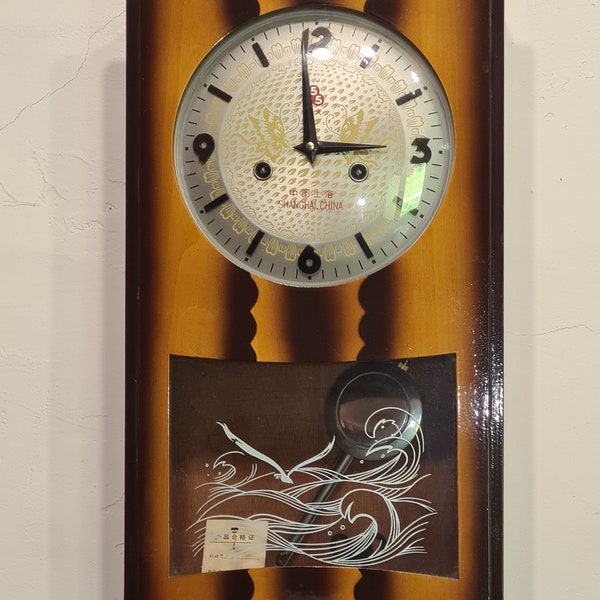Horloge murale avec pendule
