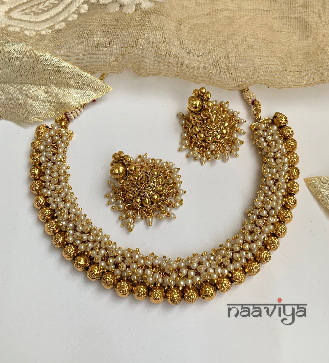 Golden alloy necklace with three pearl stone for women traditional wear main image 0