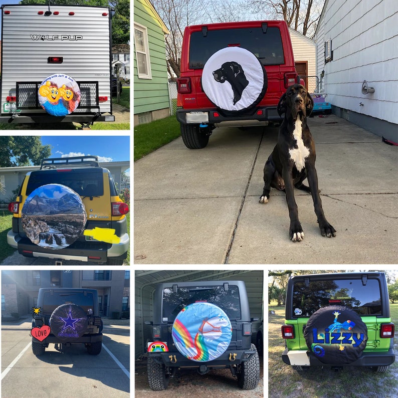 May include: A collection of different car tire covers with various designs. Some of the designs include a rainbow, a mountain scene, a cartoon dog, and a cartoon face. The tire covers are all black with white lettering.