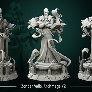 May include: A 3D printed miniature of a wizard holding books and scrolls. The wizard is standing on a circular base with candles. The miniature is painted in a gray color. The text "Zondar Valis, Archmage V2" is printed below the miniature.