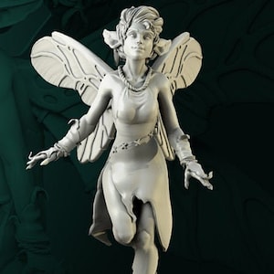 May include: A white painted figurine of a fairy with wings, wearing a dress and standing on a round base.