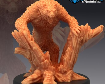 May include: A detailed, orange-brown miniature of a bear with an aggressive stance, posed over a tree stump. The bear has a snarling expression and is sculpted with textured fur. The base is a dark, circular platform. The logo "EM EPIC Miniatures" is in the top right.