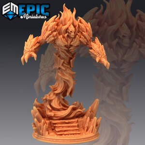 May include: A detailed, orange-toned miniature figure of a fiery elemental. The figure has a skull-like face and a swirling, flame-like body. The base features rocky formations and steps. The logo "EM EPIC Miniatures" is in the top left corner.