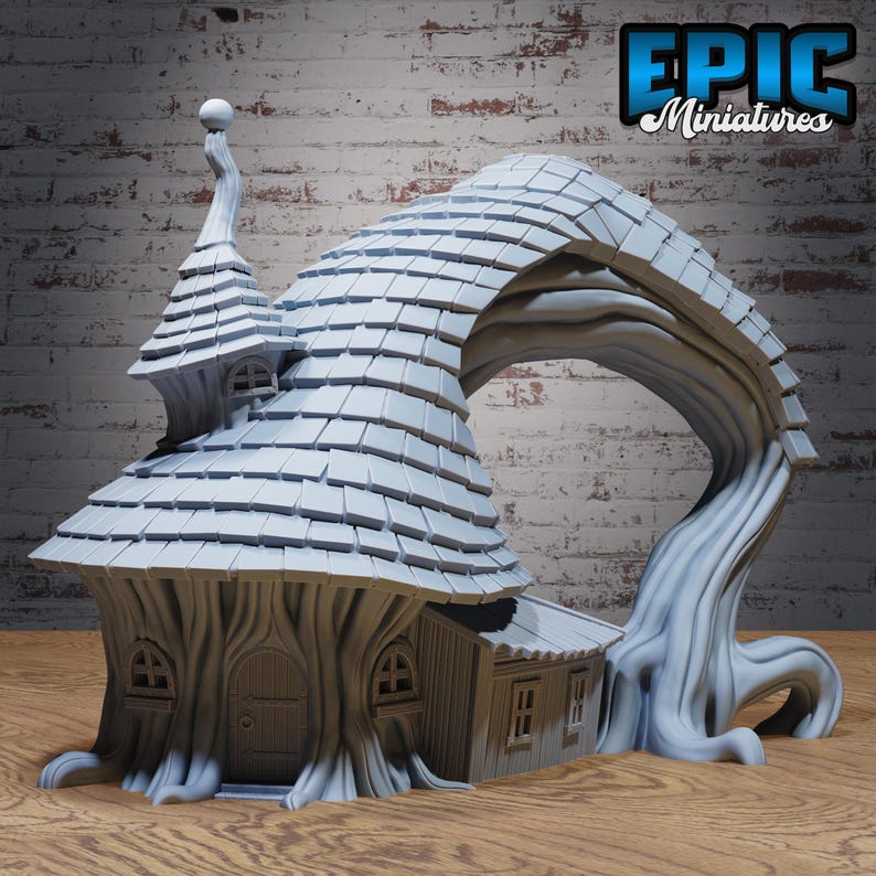 May include: A gray miniature fantasy house with a tree-like structure. The house features a shingled roof, arched doorway, and small windows. The text "EPIC Miniatures" is visible in the upper right corner.