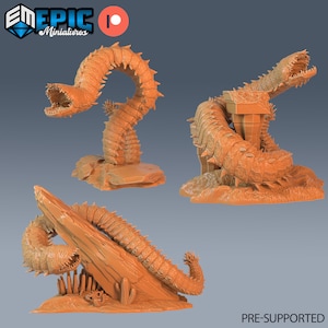 May include: Three 3D printed models of a sand worm creature with segmented bodies and sharp teeth. The worm is posed in three different positions, including curled up, crawling, and attacking. The models are pre-supported and ready to be printed.