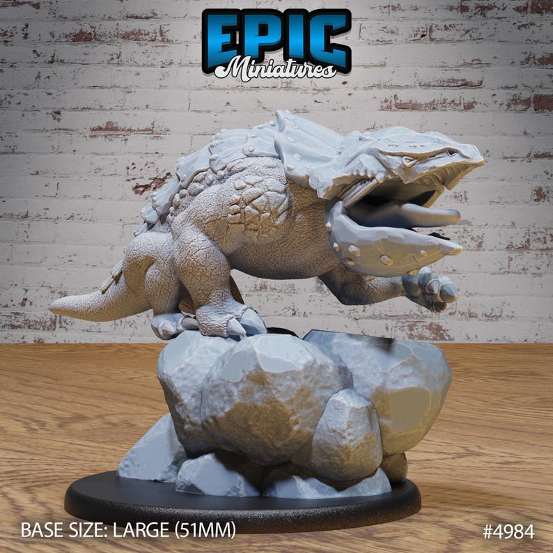 May include: A gray, detailed miniature of a creature with a large mouth and sharp teeth, standing on a rocky base. The miniature is labeled "EPIC Miniatures" and "#4984". The base size is "LARGE (51MM)".