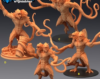 May include: Four detailed, orange-brown, two-headed, miniature figures with multiple tentacles. Each figure is posed differently and stands on a round base. The bases are labeled A, B, C, and D.