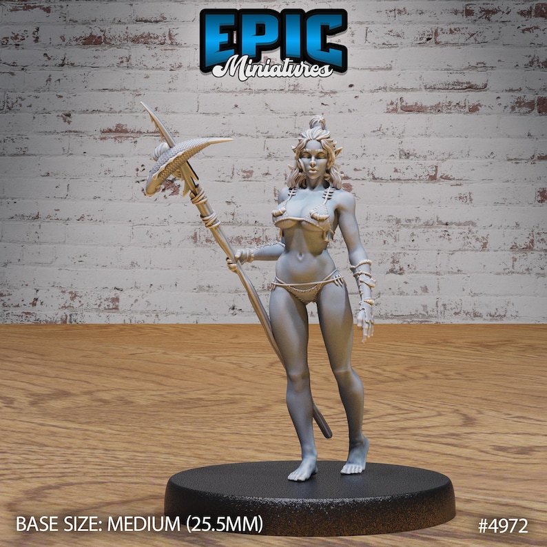 May include: A gray, unpainted miniature figurine of a woman holding a spear. She is wearing a bikini top and a skirt. The base is black and has the text "BASE SIZE: MEDIUM (25.5MM)" and "#4972".