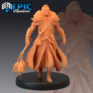 Peut inclure: Figurine miniature détaillée d'un guerrier à capuche en manteau long, tenant une masse cloutée. La figurine est de couleur orange clair, avec des détails complexes sur les vêtements et l'arme. La figurine est sur une base noire, avec le logo "EM EPIC Miniatures".