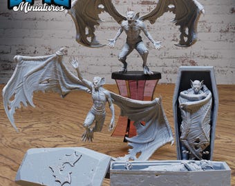 May include: A set of four 3D printed miniatures depicting a vampire in various poses. The miniatures are painted in a light gray color and feature detailed wings and clothing. The miniatures are displayed on a wooden surface.  The miniatures are labeled "EPIC Miniatures".