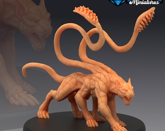 May include: A detailed miniature figurine of a monstrous creature with a feline head, a muscular body, and three long, segmented tentacles. The creature is painted in a light orange color and has a menacing expression.