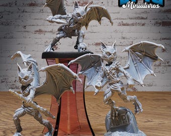 May include: A collection of gray miniature figurines of bat-like creatures with large wings, detailed fur, and armor. The figurines are posed in various action stances, with one standing on a tombstone. The Epic Miniatures logo is visible.
