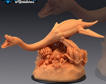 May include: A detailed, 3D printed miniature of a prehistoric marine reptile, a plesiosaur, with a long neck and flippers, posed on a base with coral and seaweed. The miniature is painted in a light brown color.