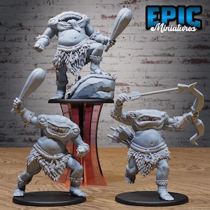 May include: Three grey unpainted resin tabletop gaming miniatures of headless creatures with wide mouths and sharp teeth. One stands on a rock holding a club, another holds a club, and the third holds a bow and arrow. Each wears a fur-like loincloth.