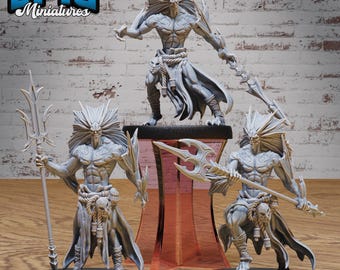 May include: Three unpainted miniature figures of humanoid creatures with long hair and sharp teeth, holding spears. The figures are standing on circular bases. The figures are made of a gray plastic material. The figures are from the Epic Miniatures brand.