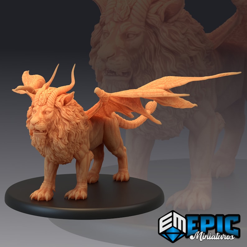 May include: A detailed miniature figurine of a winged lion with a fierce expression. The lion has a mane of fur, horns, and feathered wings. The figurine is painted in a light orange color.