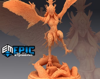 May include: A detailed, orange-colored miniature figurine of a bird-like creature with feathered wings, a human-like torso, and a feathered headdress. The creature is standing on a tree stump with roots and vines. The miniature is on a round base.