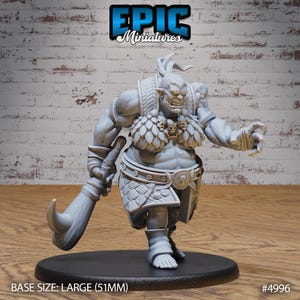 May include: Gray plastic miniature of a large, female ogre-like creature with a club, wearing a skull necklace and a skirt made of scales. The miniature is posed in a running stance with one arm raised, holding the club. The base is black and reads "BASE SIZE: LARGE (51MM)" and "#4996".