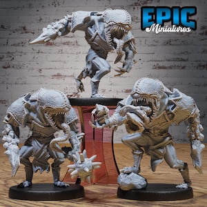 May include: Three gray, detailed, miniature figures of creatures with sharp teeth and claws. The figures are posed in a dynamic action stance. The figures are on a black base and a pink pedestal. The text "EPIC Miniatures" is in the upper right corner of the image.