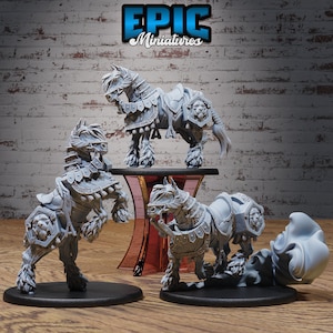 May include: Three gray, detailed miniature horses wearing armor and standing on black bases. The horses are in various poses, with one standing on its hind legs. The miniatures are from Epic Miniatures.