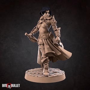 May include: A detailed miniature figurine of a female warrior wearing leather armor and a flowing cloak. She holds a sword in her right hand and has a determined expression on her face.